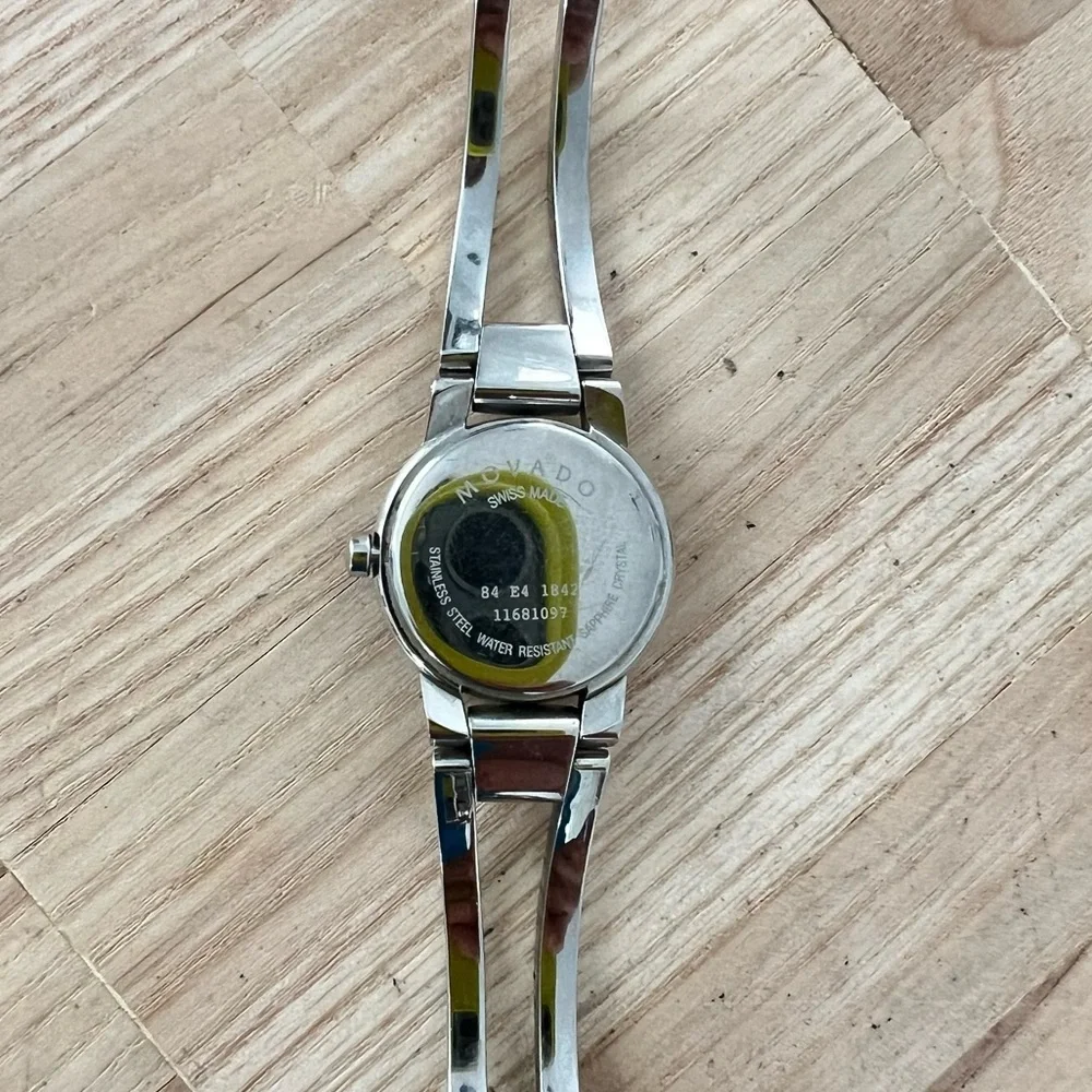 Movado Swiss Made ladies black dial stainless steel minimalist watch NEW BATTERY